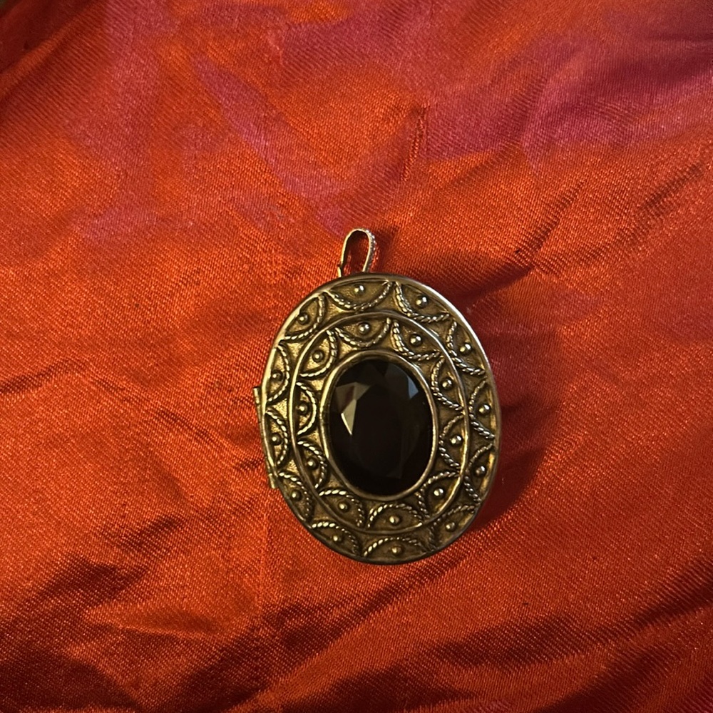silver locket / brooch